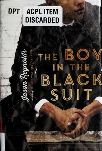 The boy in the black suit cover